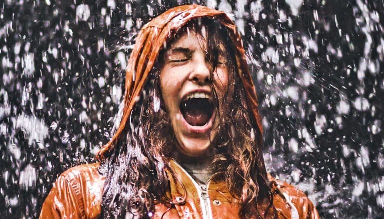 woman screaming in the rain (screams concept)