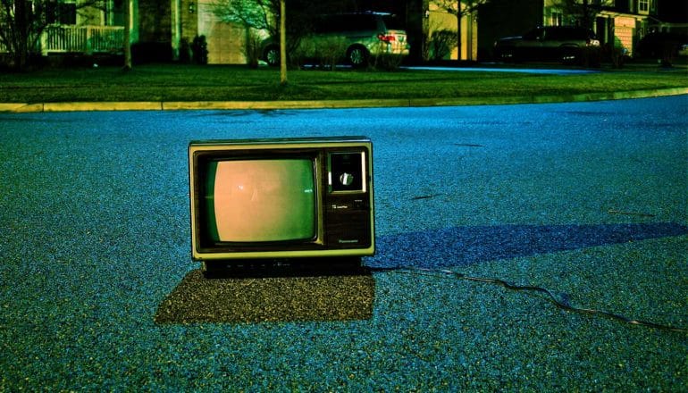 retro tv in the street (deepfake videos concept)