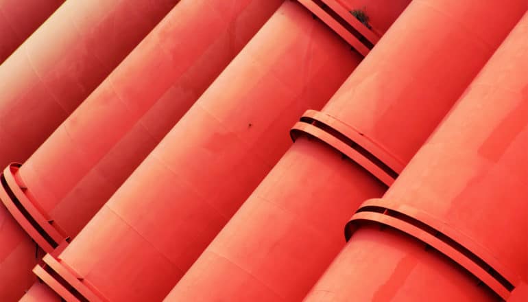 row of red pipes (stroke concept)