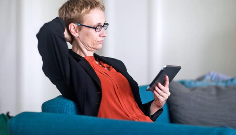 woman using tablet - social media