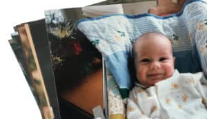 stack of 80s baby photos - social bonding