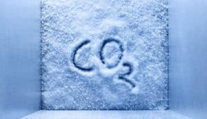 "CO2" written in frost - breast cancer treatment concept