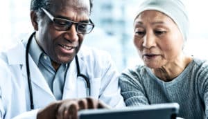 doctor and patient talking (cancer care concept)