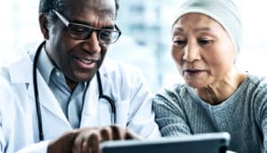 doctor and patient talking (cancer care concept)