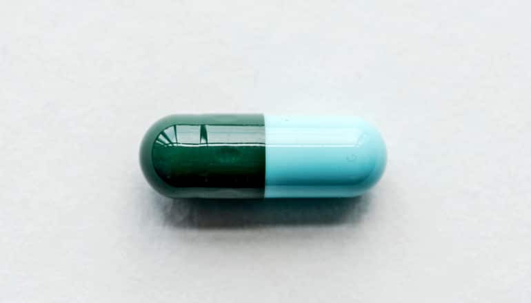 green-blue pill on white - chronic kidney disease