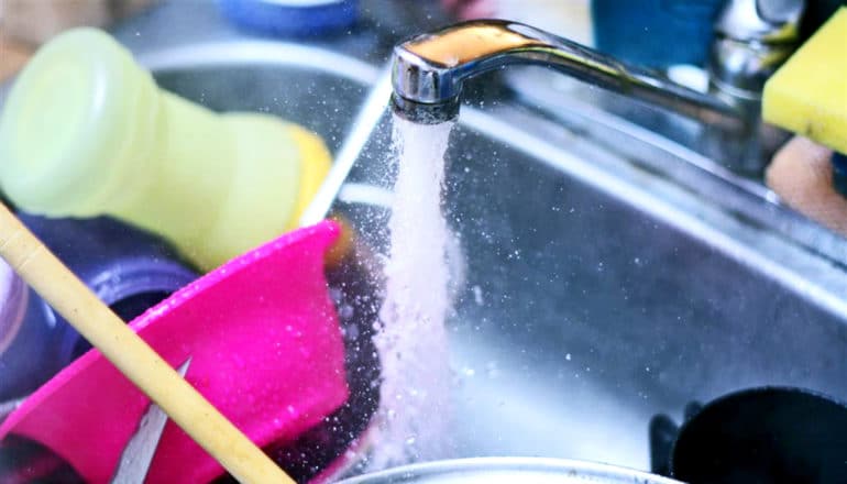 water pours from kitchen tap -- manganese