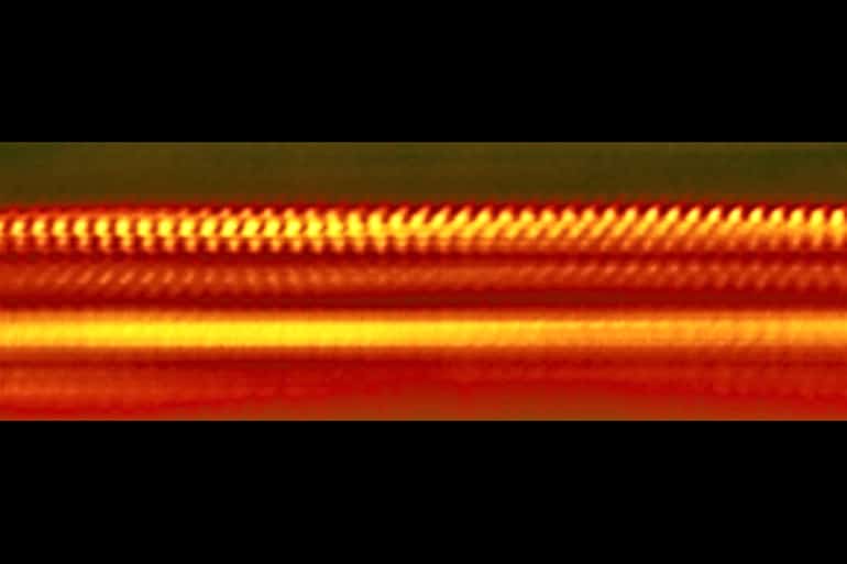 Bands of orange and red with different brightnesses sit on a black background.