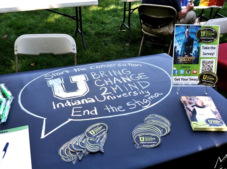 The image shows a U Bring Change to Mind information and recruitment table at IU's Involvement Fair in September 201