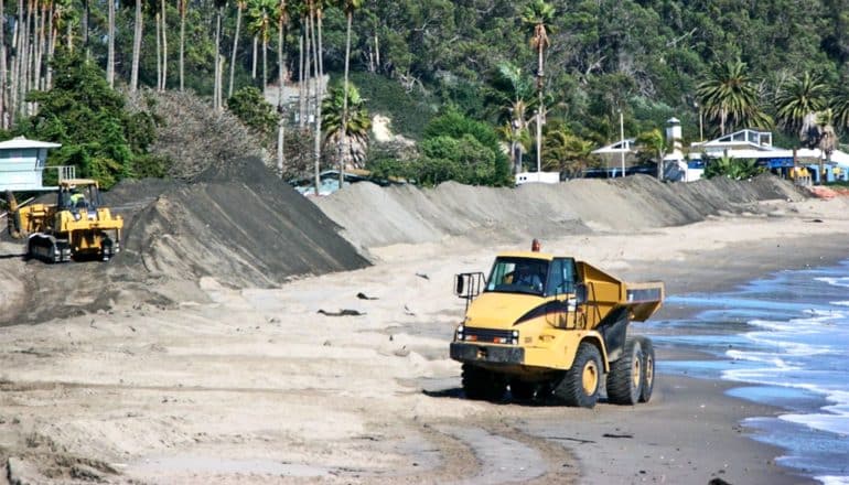 The image shows nourishment efforts on Goleta Beach involving earth-moving vehicles. (Beaches concept)