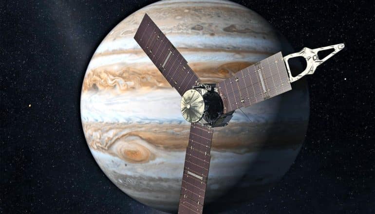 An artist’s concept of the Juno spacecraft in orbit around Jupiter.