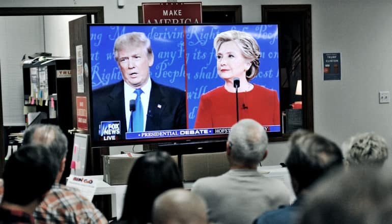 Viewers watch the first presidential debate in 2016 between Donald Trump and Hillary Clinton