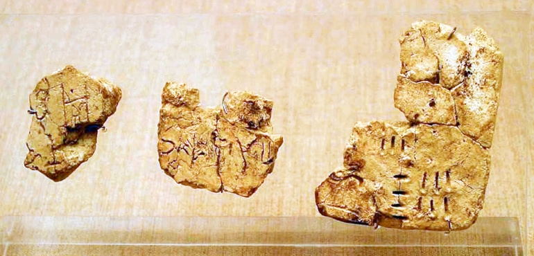 Linear A on three tablet fragments