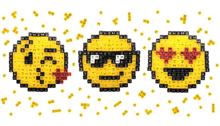 tiny magnets form kissy face, sunglassses, and heart-eyes emoji