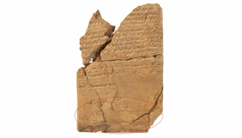 broken tablet with cuneiform and red circle around "demon" at bottom