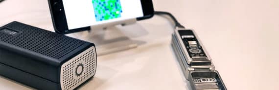 The device, which is smaller than a phone, is connected by a wire to the smart phone and the black box MinIT