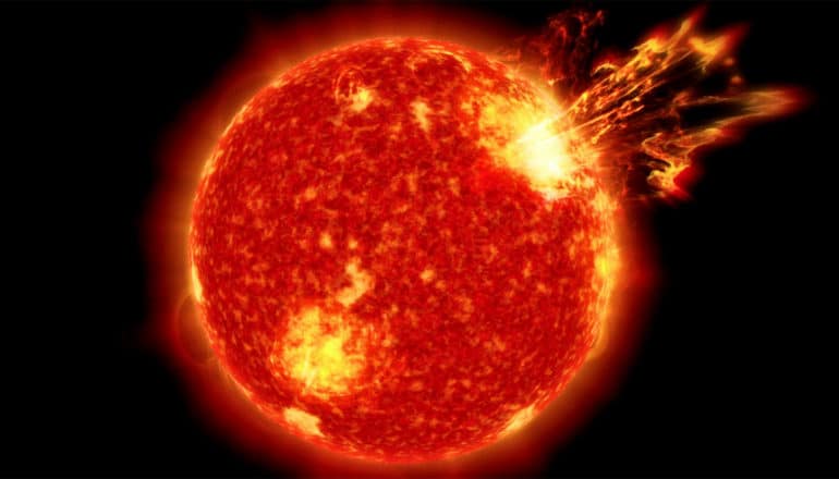 Solar flares burst from the sun, which looks dark red and orange against a black background