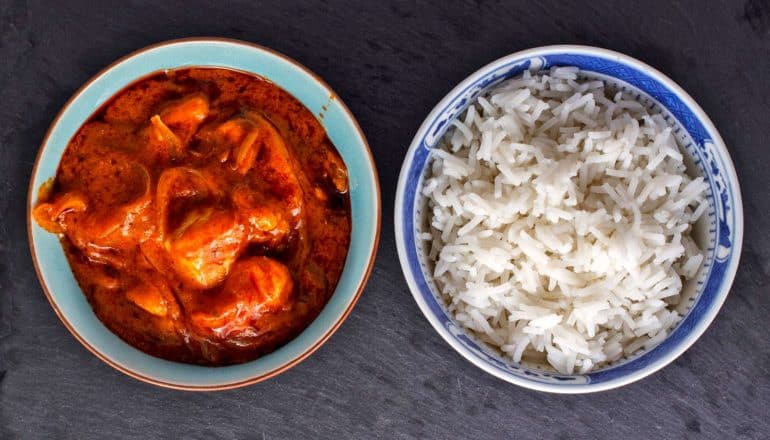 bowl of tikka masala and bowl of basmati rice