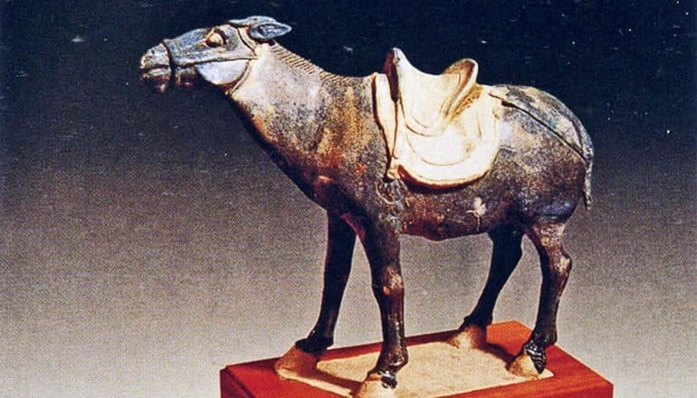 A donkey artifact shows the donkey wearing a saddle while mounted on a red base