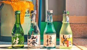 four colorful bottles of sake