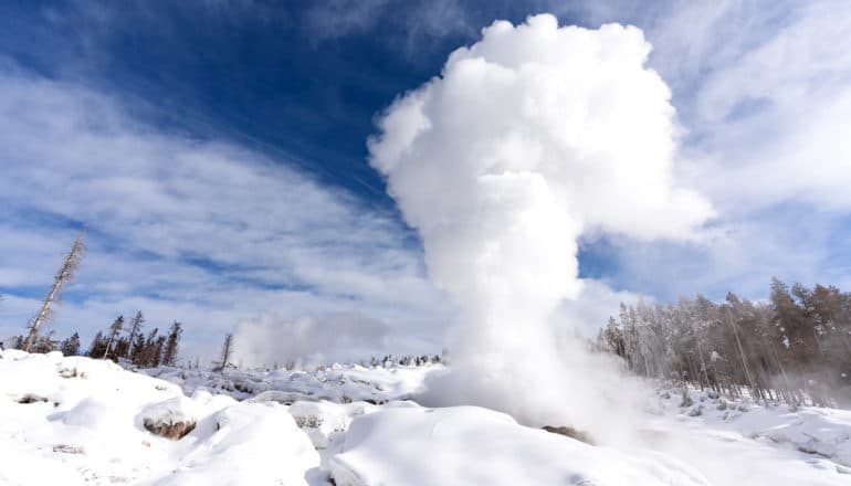 plume of steam with snowy landscape