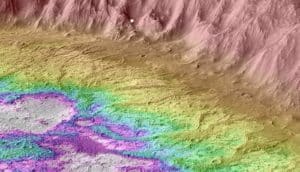 The crater on Mars is colored to show where water gathered at its bottom