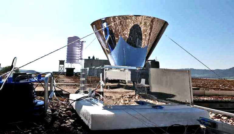 A cone-shaped device on top of a box on a roof