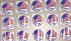 many shiny "I voted" stickers