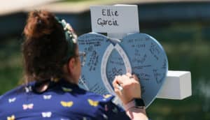 adult writes on memorial for Uvalde shooting victim Ellie Garcia