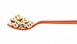 B-shaped cereal in a red spoon