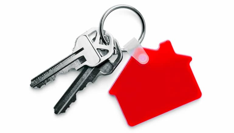 key ring with keys and red house-shaped keychain