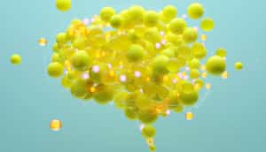 digital illustration of yellow spheres forming brain-like shape