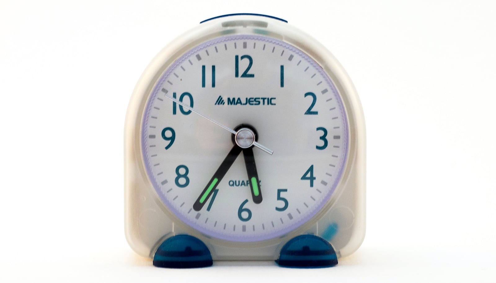 small white clock on white