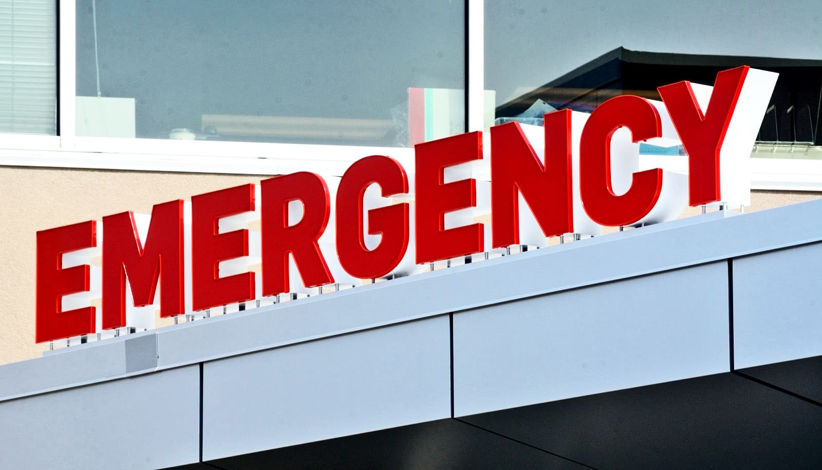"emergency" in big red letters on building