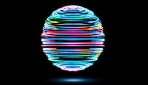 A ball made of circling lights of different colors against a dark background.