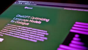 screen says "chatGPT optimizing language models for dialogue" in purple on green background