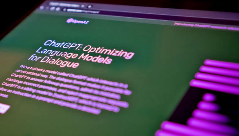 screen says "chatGPT optimizing language models for dialogue" in purple on green background