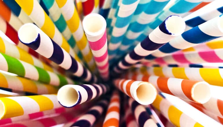 A group of colorful straws shot from above.
