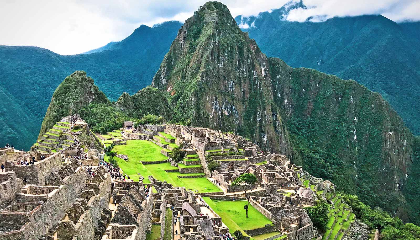 green and brown mountain under blue sky during daytime, Machu Picchu, Cusco - PerĂș green and brown mountain under blue sky during daytime, Machu Picchu, Cusco - PerĂș