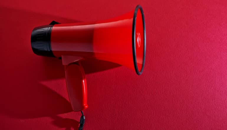 red megaphone on red background