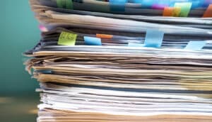 stack of papers and folders