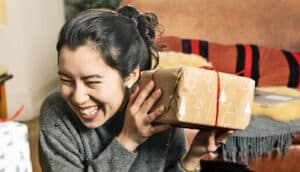 smiling person shakes present