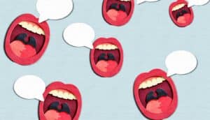 Paper cutouts of human mouths with speech bubbles coming out of them.