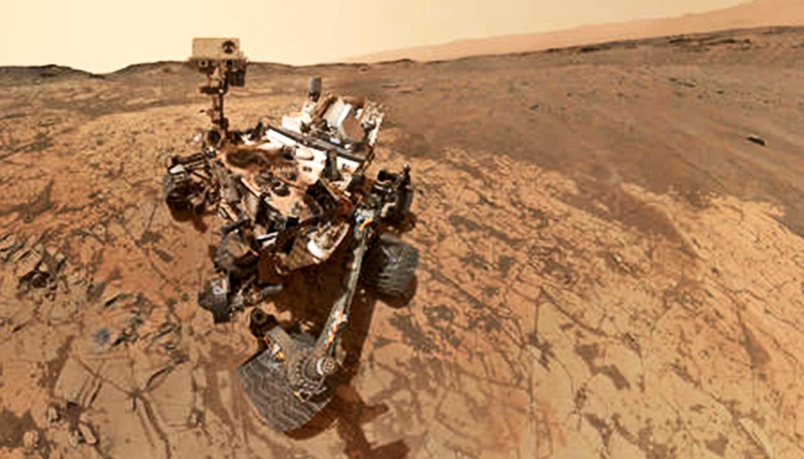 A picture of the Mars Curiosity Rover on the red planet.