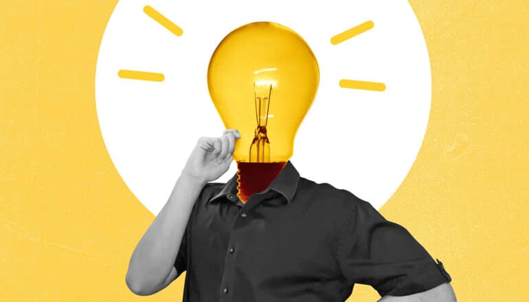 A person's head is replaced with a photo of a lightbulb as they look deep in thought.