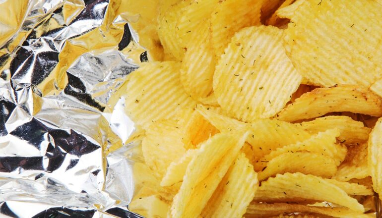 A view of the inside of a bag of potato chips.