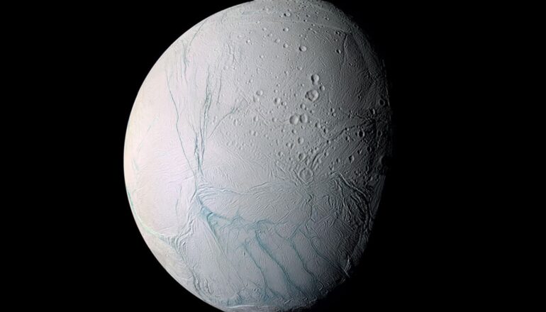 Enceladus looks white and has blue streaks across it.
