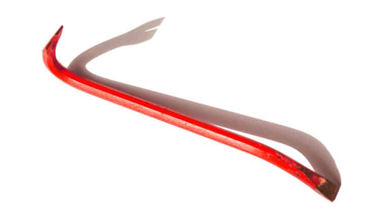 A red crowbar on a white background.