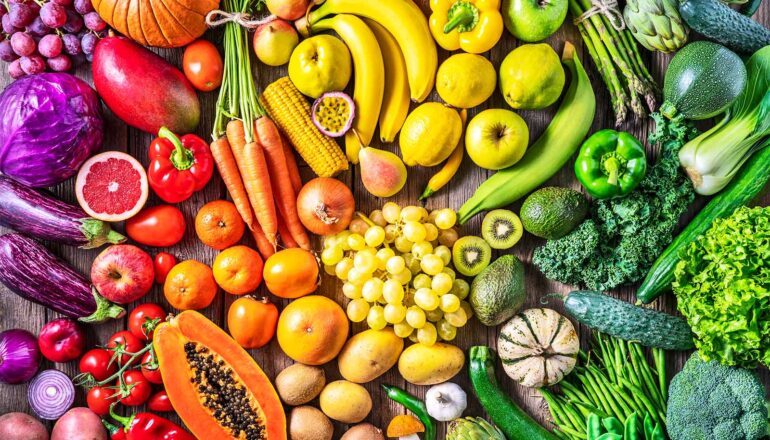 A color-coordinated spread of vegetables and fruits.