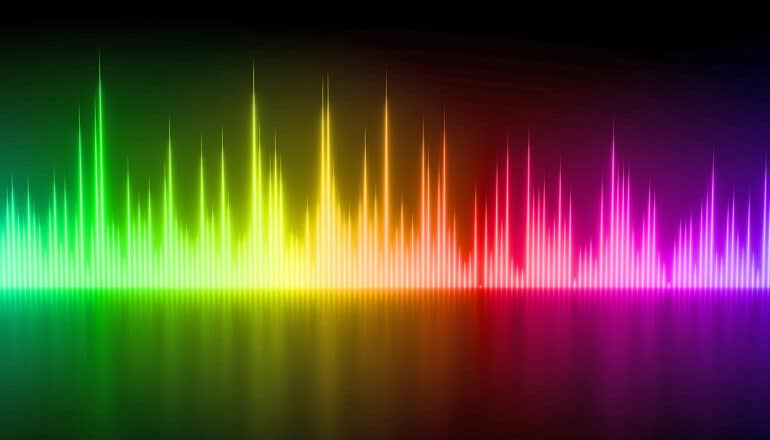 Colorful sound waves on a black background.
