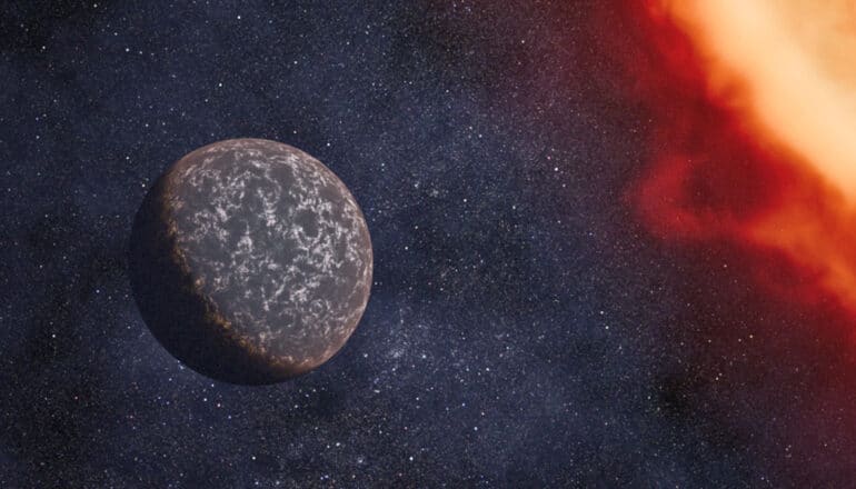 The illustration shows a dark planet near a fiery star.